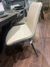 Richie dining chair in a neutral stone PU priced each