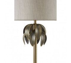 Herta table lamp with leaf design on antiqued brass base