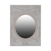 Oval framed ornate mirror