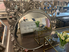 Ornate large silver Mirror sold now