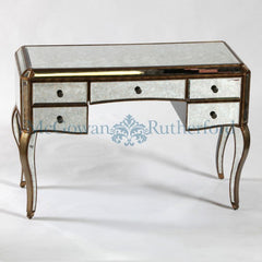 Antiqued glass dressing table with gold trim