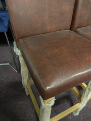 2 leather and oak colour bar stools Ex display  unwrapped so for collection only. Pay Instore only