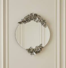 Oval large antiqued mirror with double butterfly  detail collect only or arrange delivery