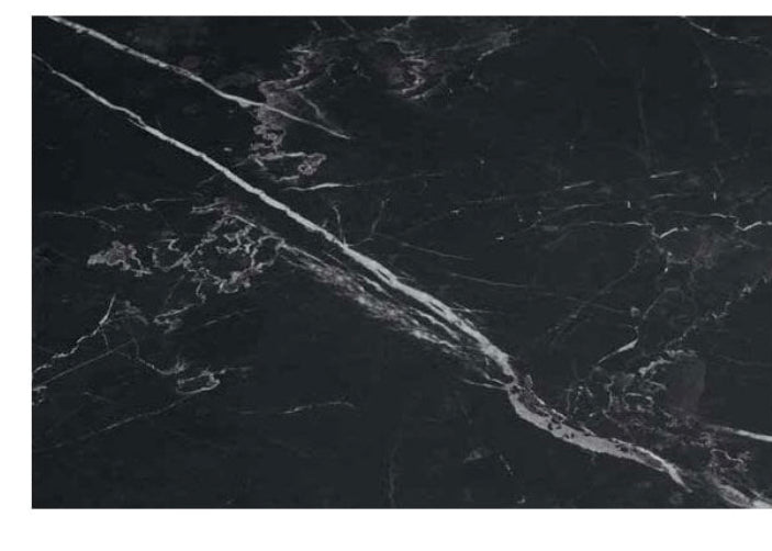 Berkeley  1.8 black Matt black sinterex stone top  table with brushed brass spider leg