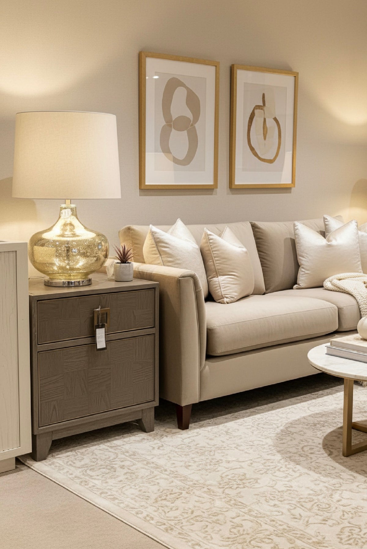 Hill Table lamp with shade in a gentle gold finish.