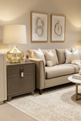 Hill Table lamp with shade in a gentle gold finish.