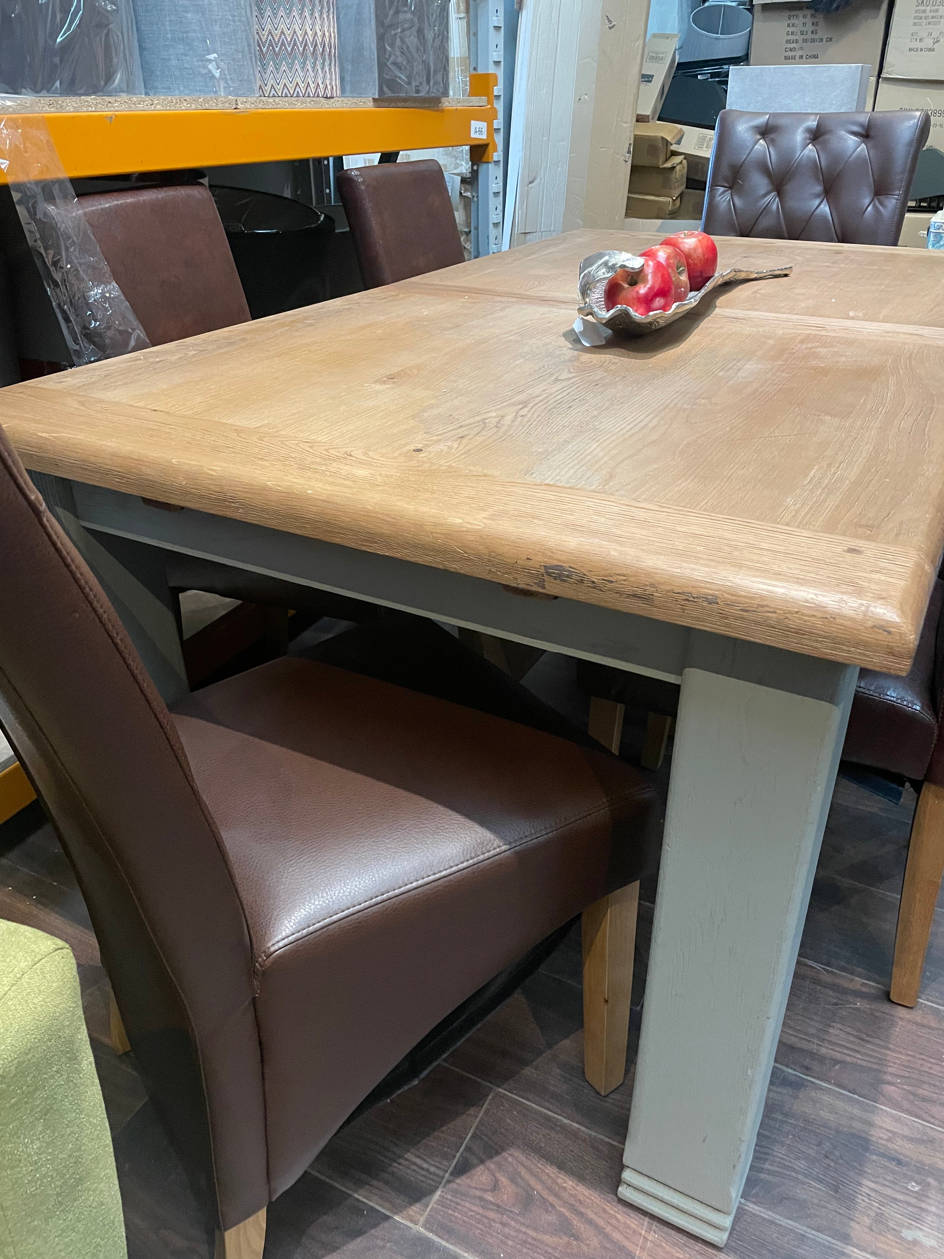 Daniel Weathered Oak Extending table with Elephant breath base ex display