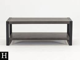 Branko coffee or TV table . Walnut and steel for collection only