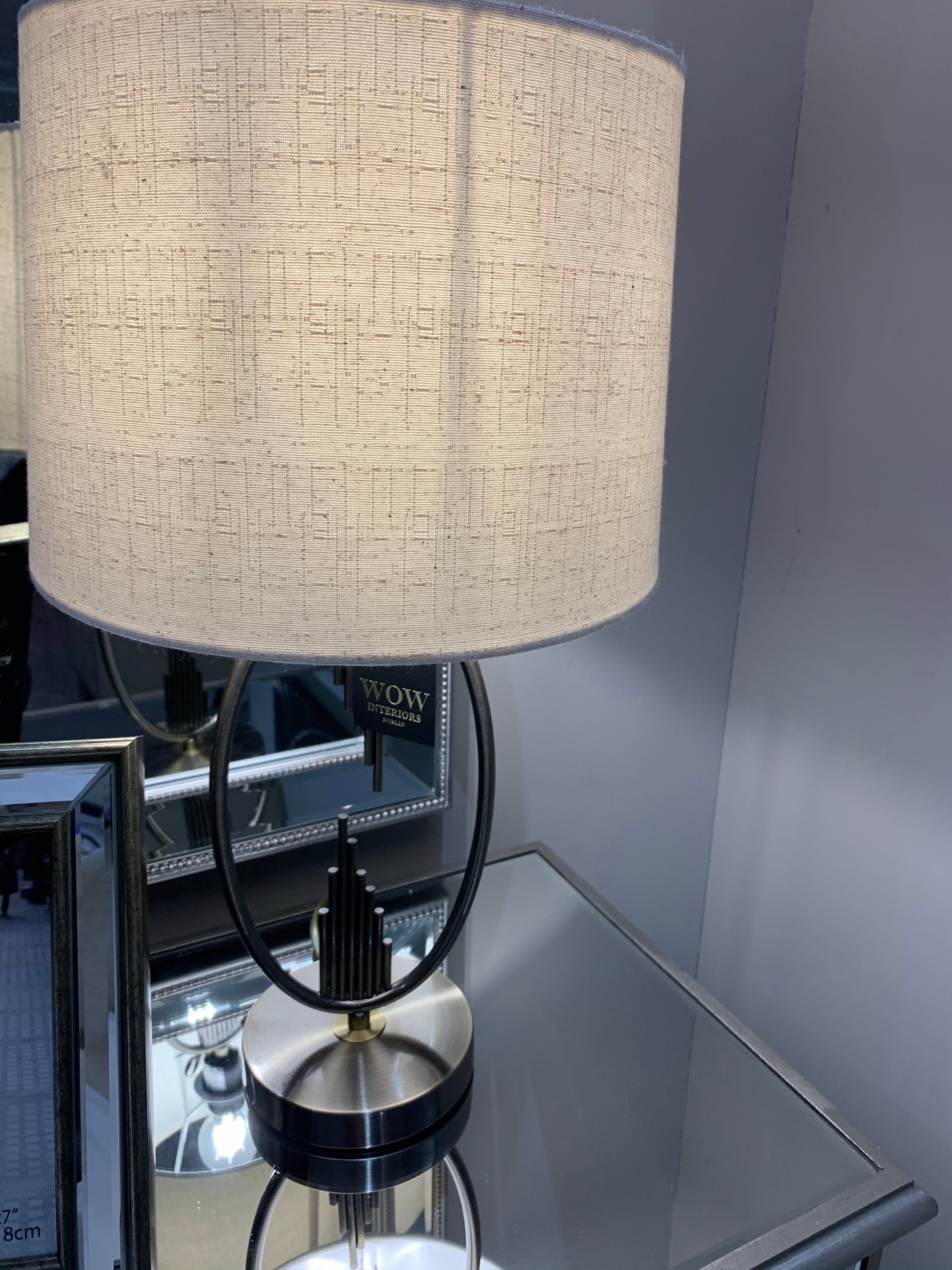 Table lamp  aged brass colour with cream linen style shade Instore only