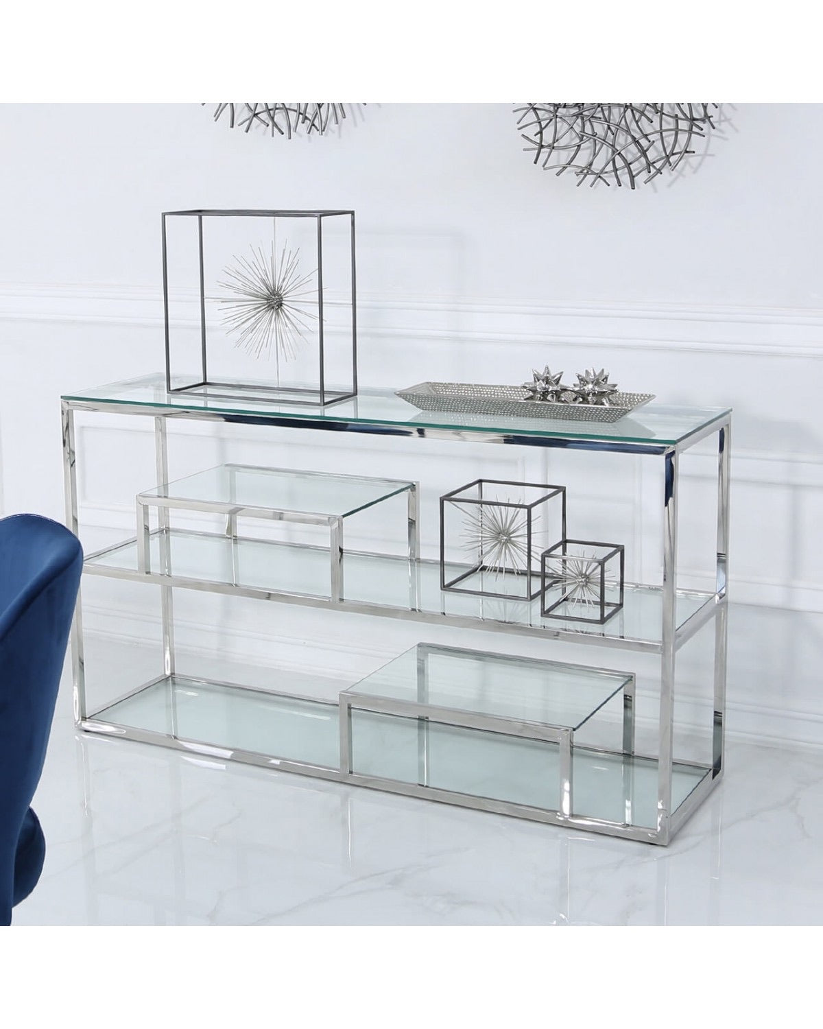 Harriet chrome and glass console table with tiered shelf.