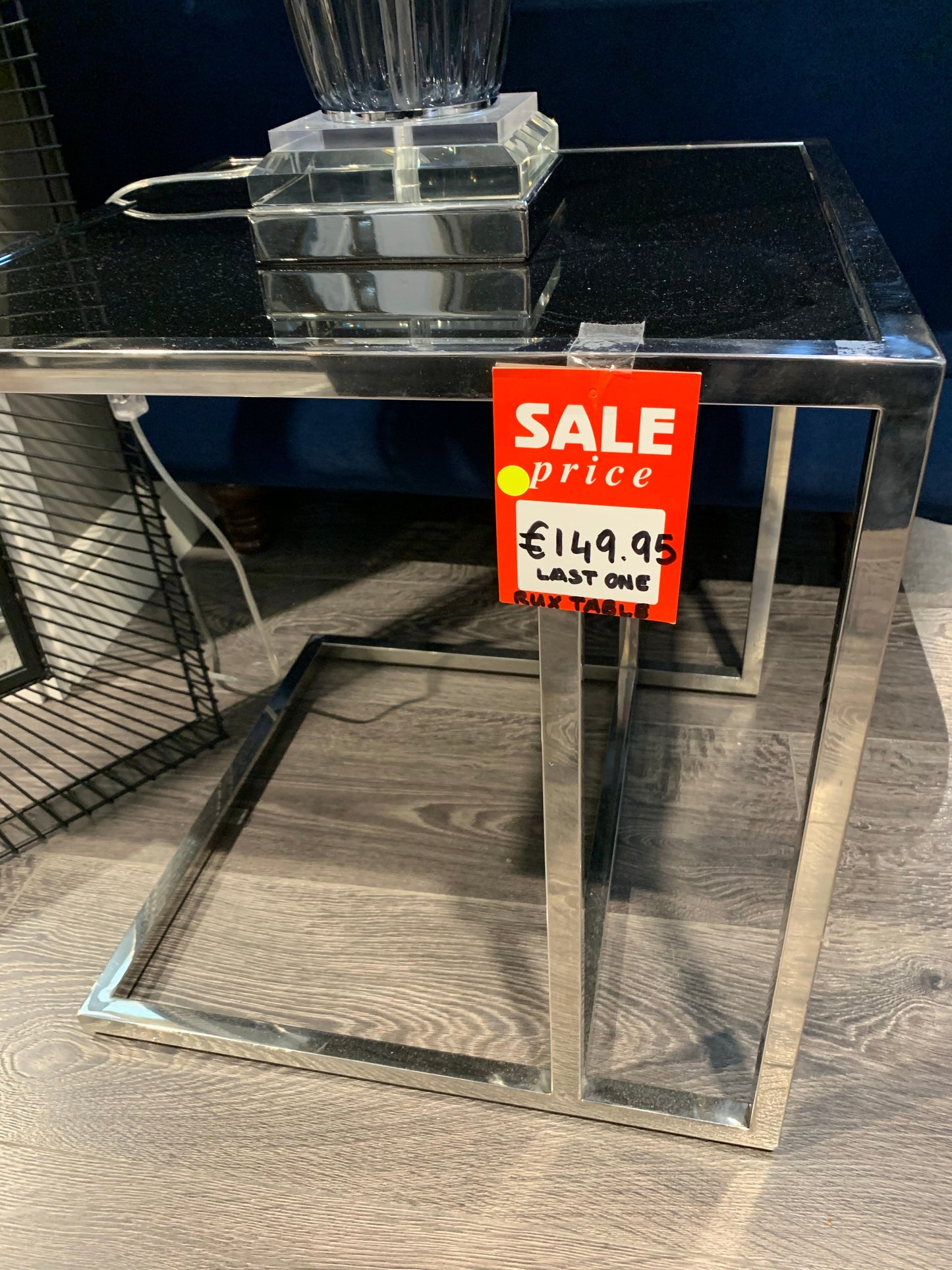 Chrome and black glass sofa table ex display