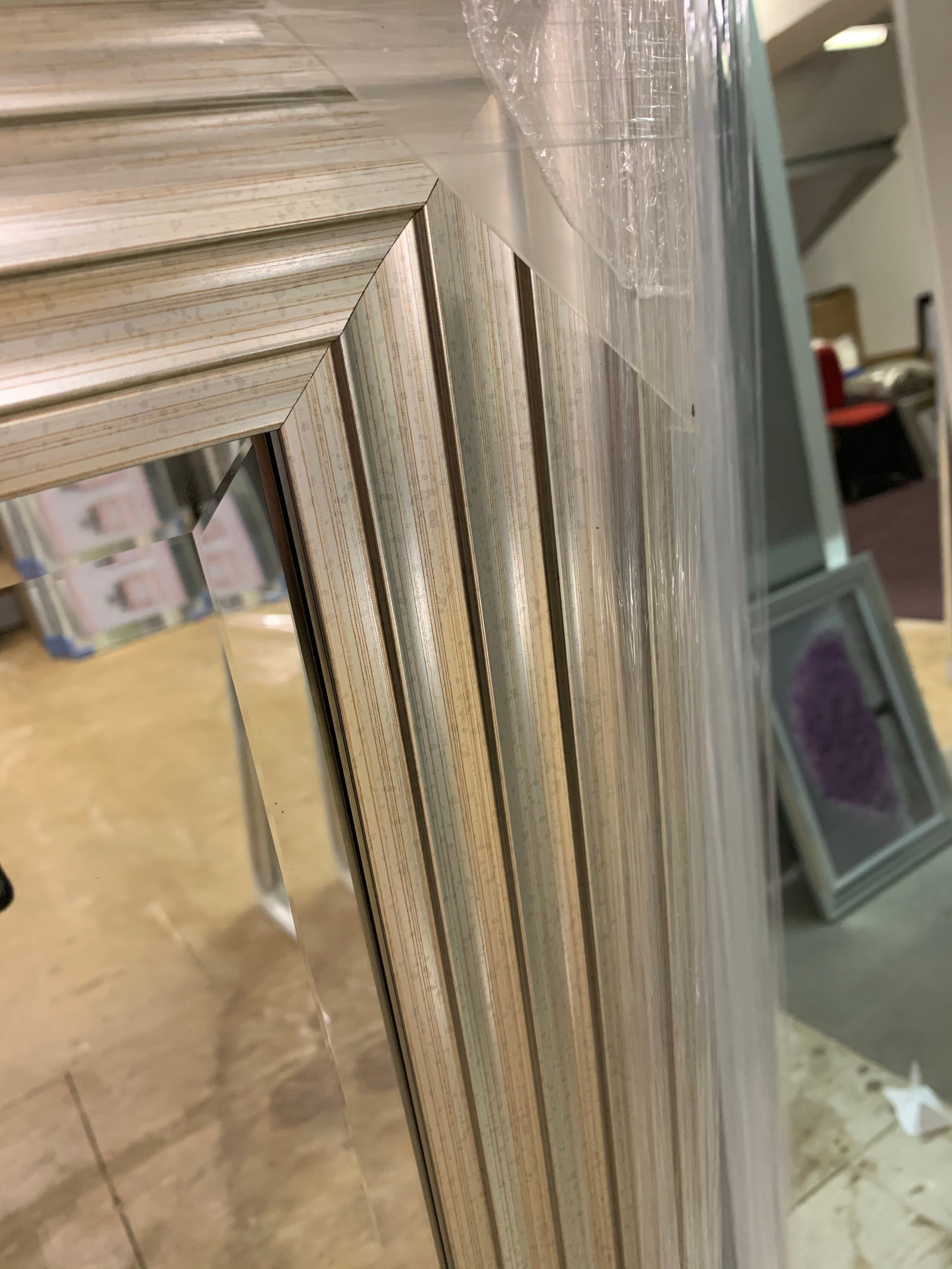 Mirror with champagne stepped frame 45 x 136cm