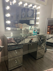 Rachel Hollywood 7 drawer glass mirrored dressing table  on massive clearance offer View in store prior to purchase