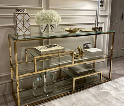 Harriet chrome and glass console table with tiered shelf.