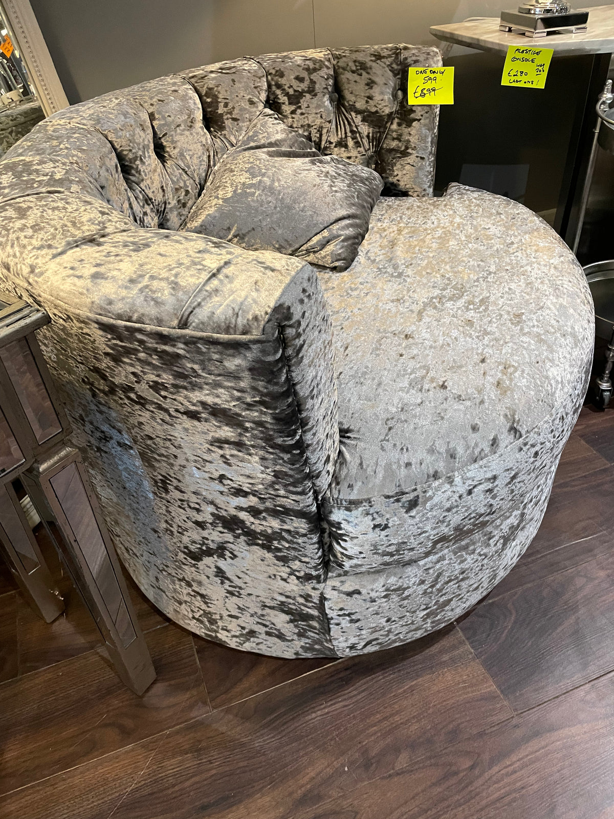 Swivel velvet armchair  less than half HALF PRICE . Instore purchase only